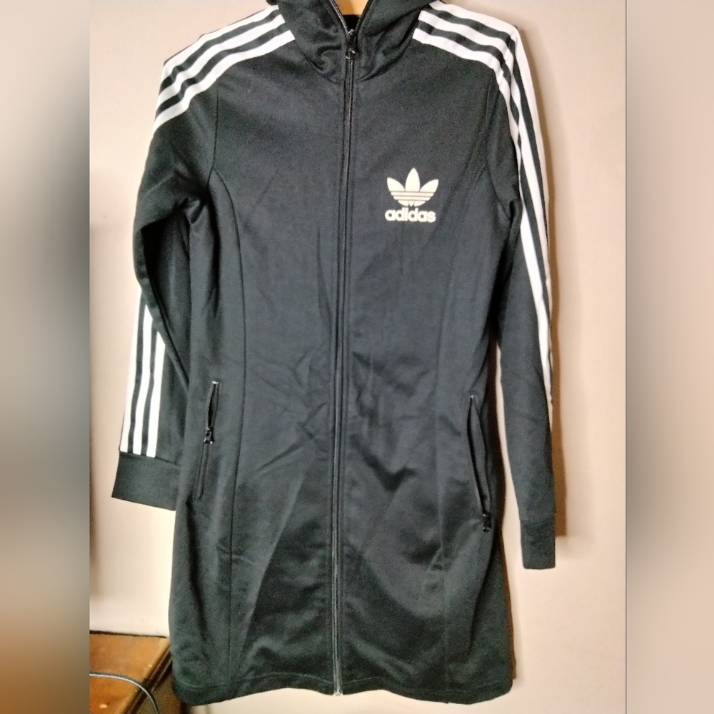 Women's long Adidas sweat jacket. No tag but looks to be med-large.